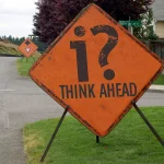 think ahead sign symbolizing critical thinking in decision making